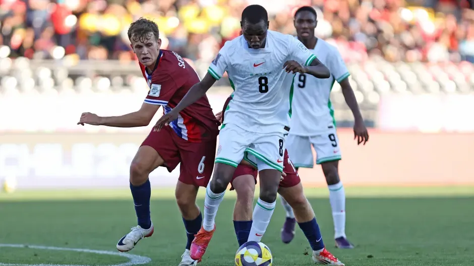 abduljelil-kamaldeen-nigeria-runs-ball-1027593633.webp